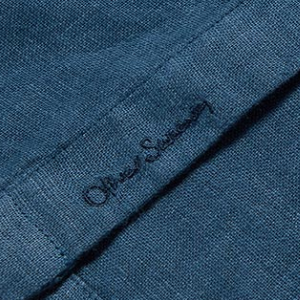 Closeup of Embroidered branding on placket